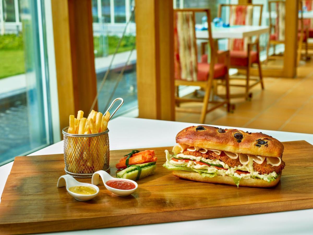 O By Tamara, Trivandrum Thiruvananthapuram Exterior photo A chicken sub